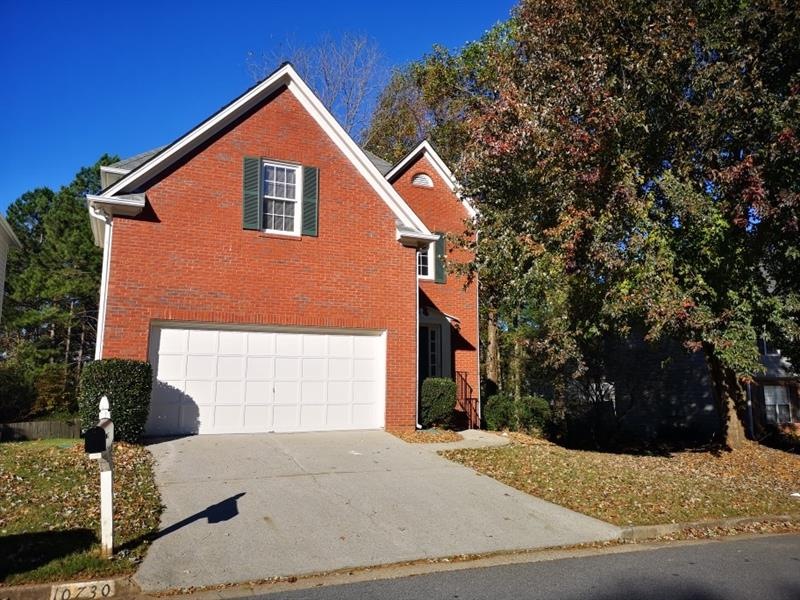 Brick front 4 bedroom single home in a well establ