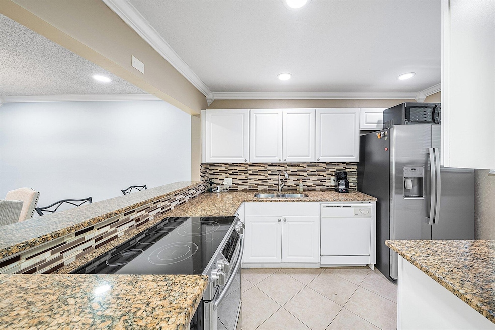 4381 Trevi Ct unit 202, Lake Worth, FL 33467 - photo 1