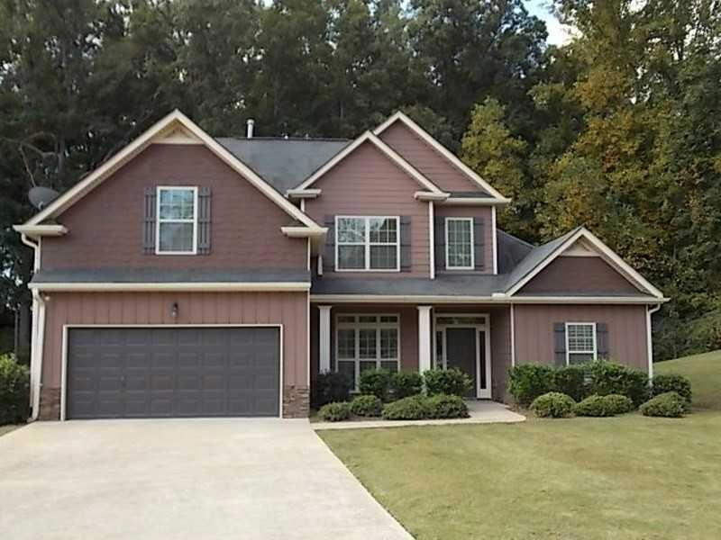 Exterior Front. Traditional home on level lot in s