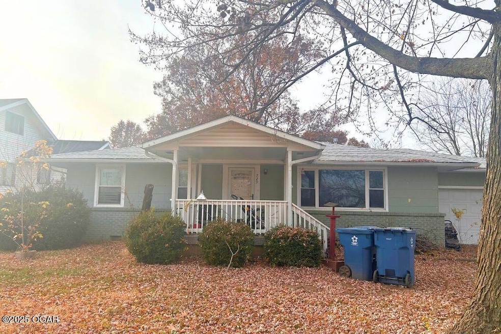 229 N Denton, Liberal, MO 64762 - photo 1