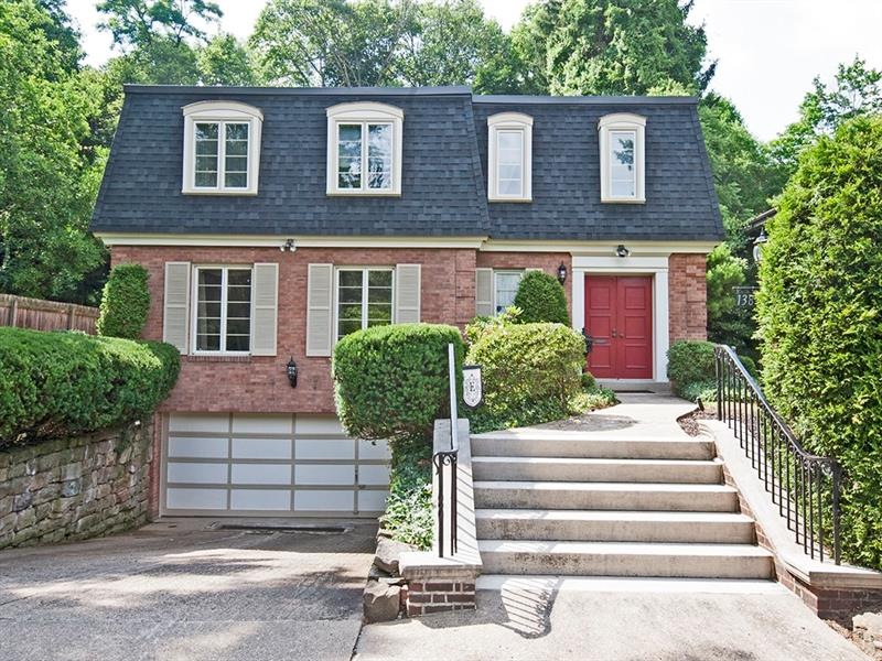 This beautiful brick home is nestled in a cul-de-s