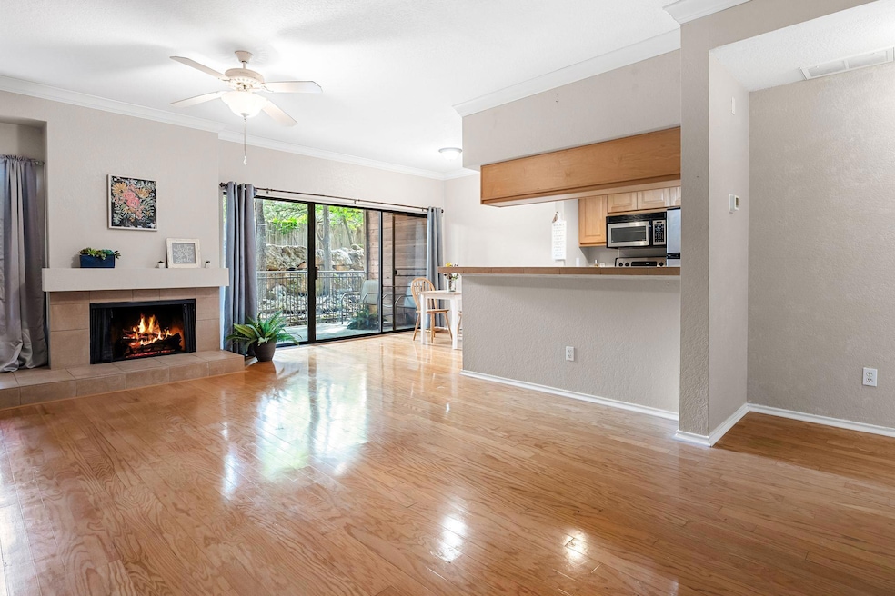 Unfurnished living room featuring light wood fini