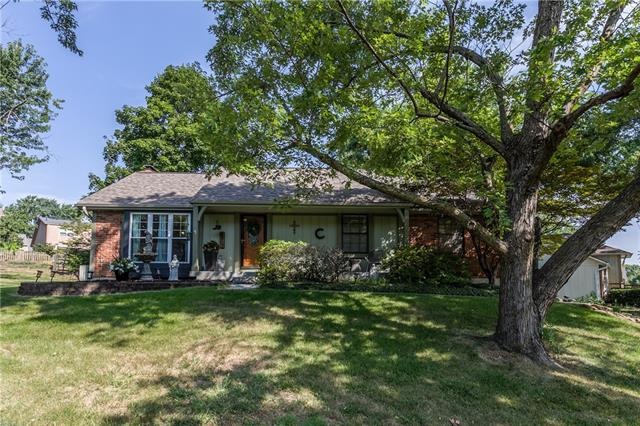 This adorable ranch home sits on a treed 1/3rd  ac