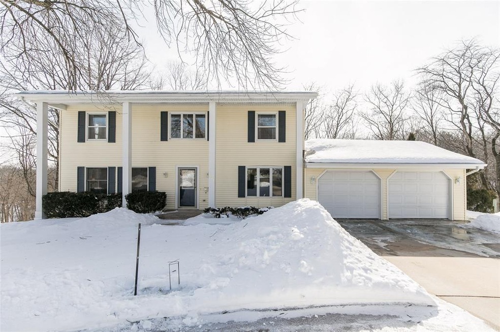 Spacious 2 story Colonial on a wooded, quiet Cul-D