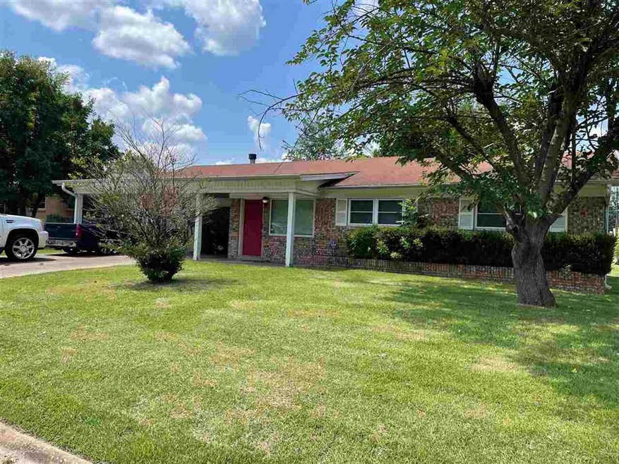 211 W Pioneer St, Wake Village, TX 75501 - photo 1