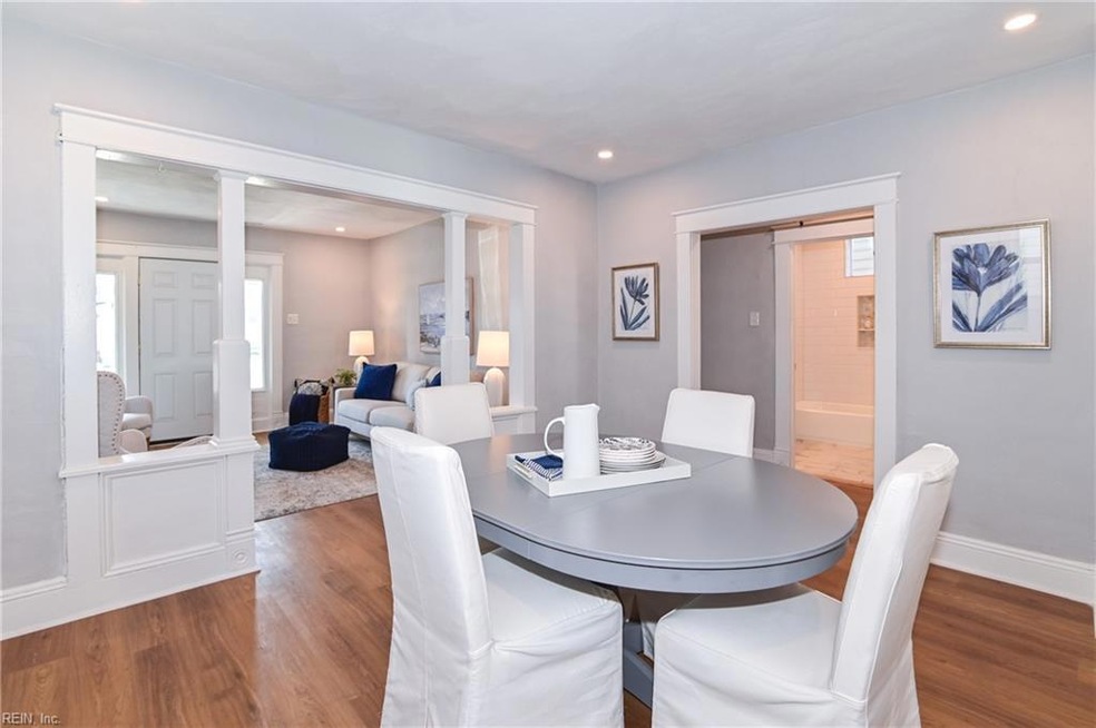 Welcome to 3131 Lyons Avenue, a luxuriously renovated Classic Norfolk Coastal Cottage.