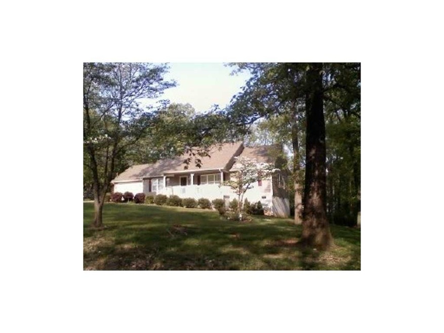 Exterior Front. Spacious home with manicured lawn 