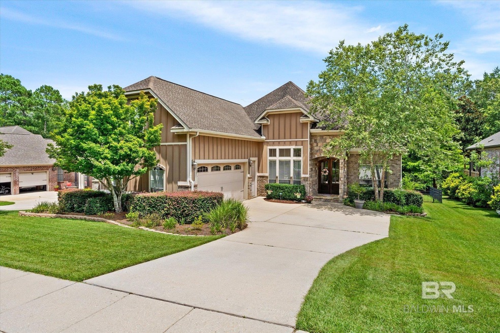Craftsman-style house with a front yard