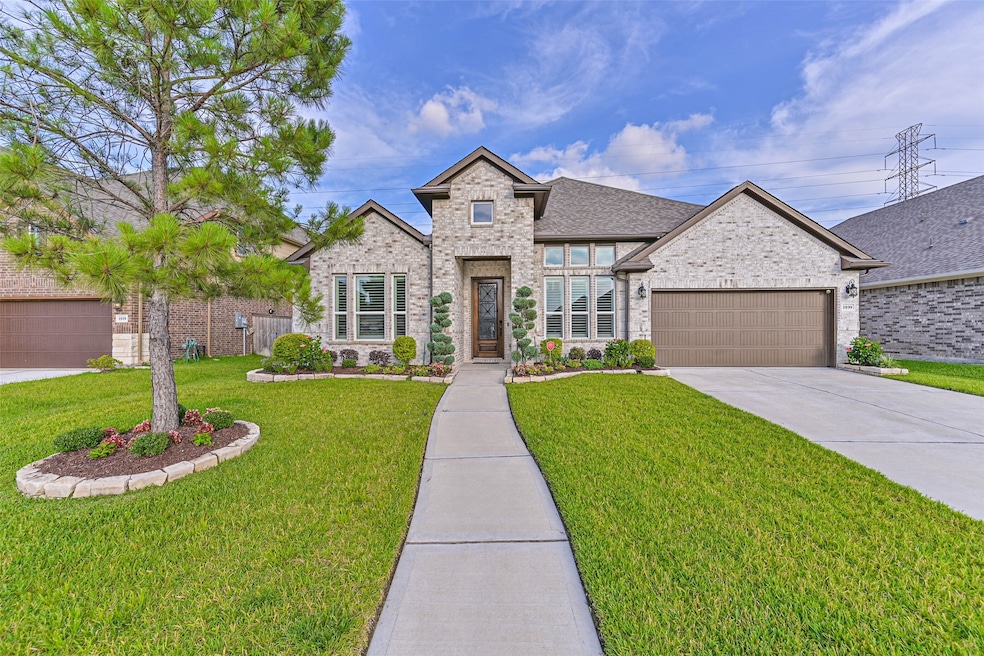 Elevation of the home featuring a well-maintained