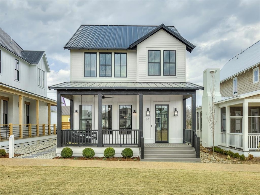 Modern inspired farmhouse with a standing seam roo