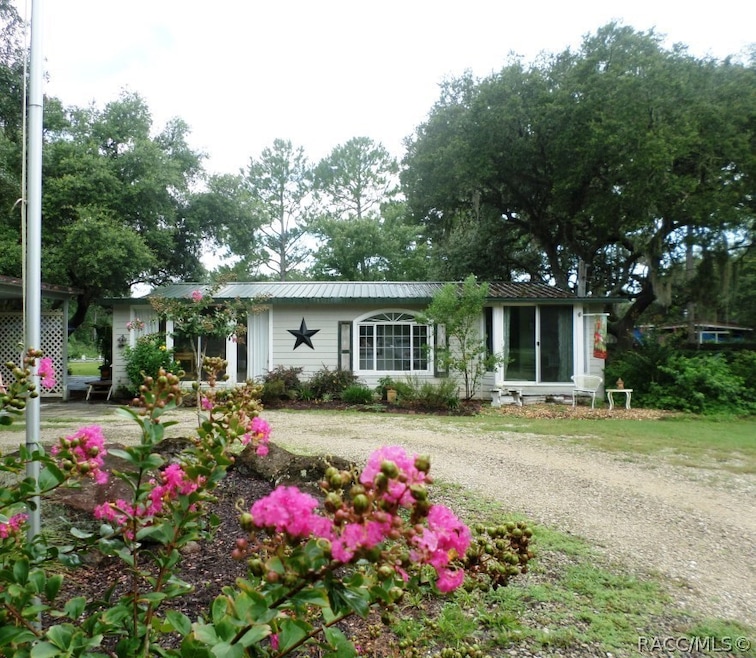 9350 N Cedar Cove Rd, Dunnellon, FL 34434 - photo 1