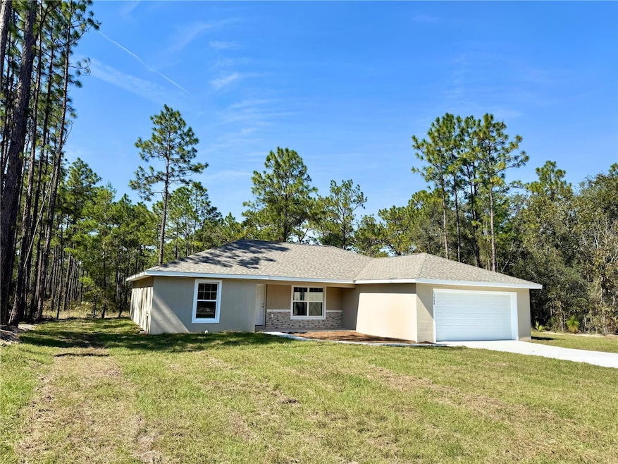 704 W Haguer Place, Dunnellon, FL 34434 - photo 1