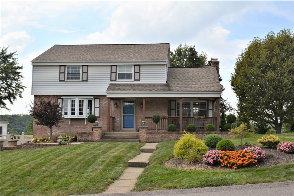 Lovely exterior front with covered front porch!