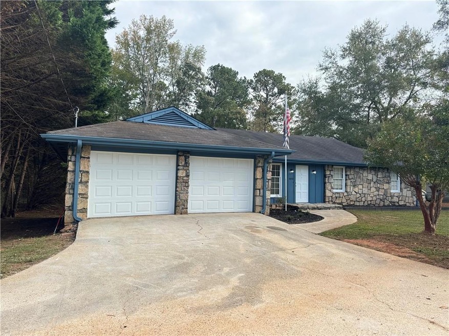 Single story home featuring a garage