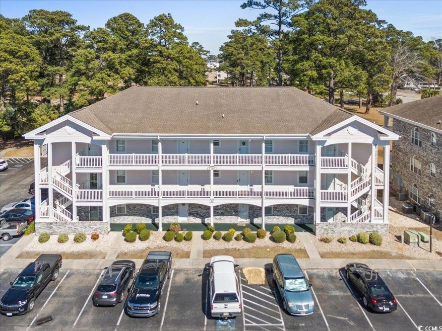 Exterior space with uncovered parking