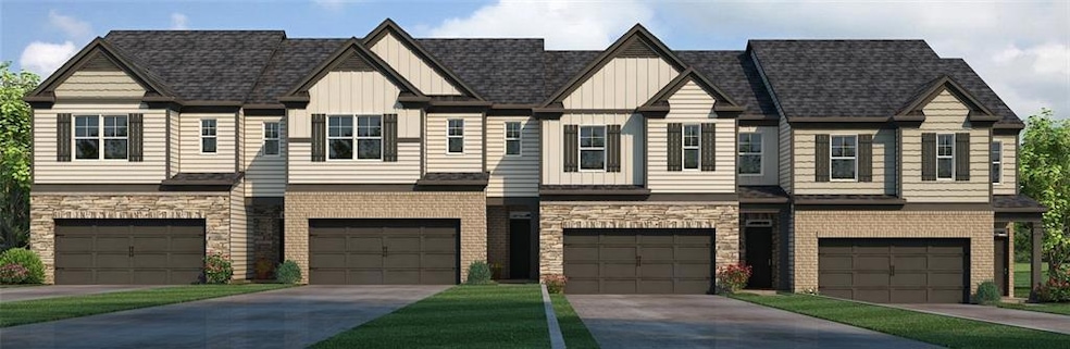 View of property with a garage