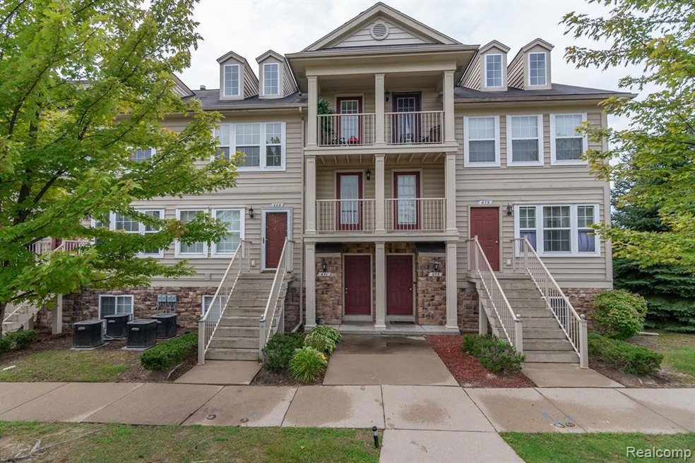 671 Lewa Downs Dr unit 102, Pontiac, MI 48341 - photo 1