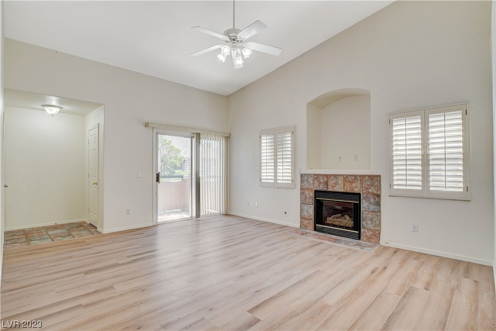 Fireplace and balcony off the living room