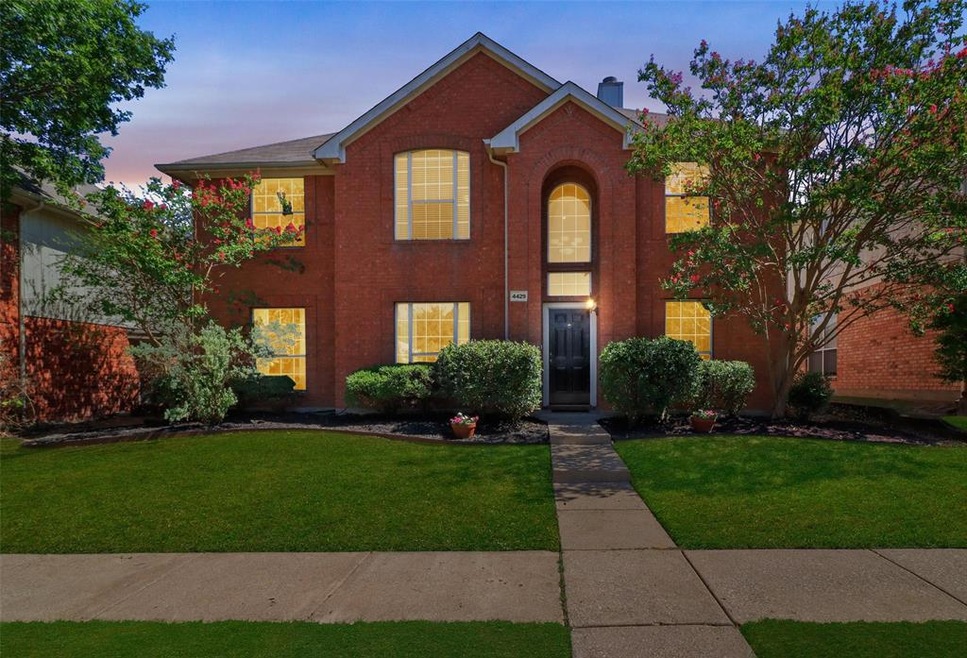 This terrific two-story traditional 2,442 sq ft re
