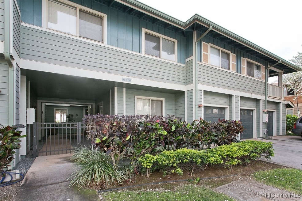 Private gated courtyard entry and enclosed garage.