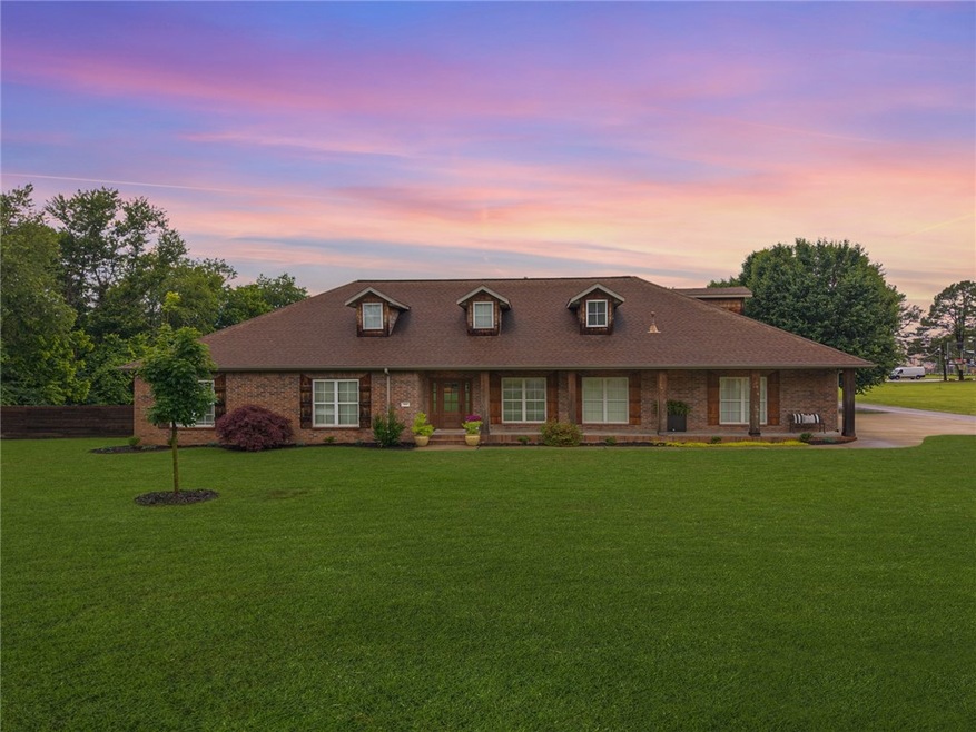 Charming curb appeal with classic brick exterior,