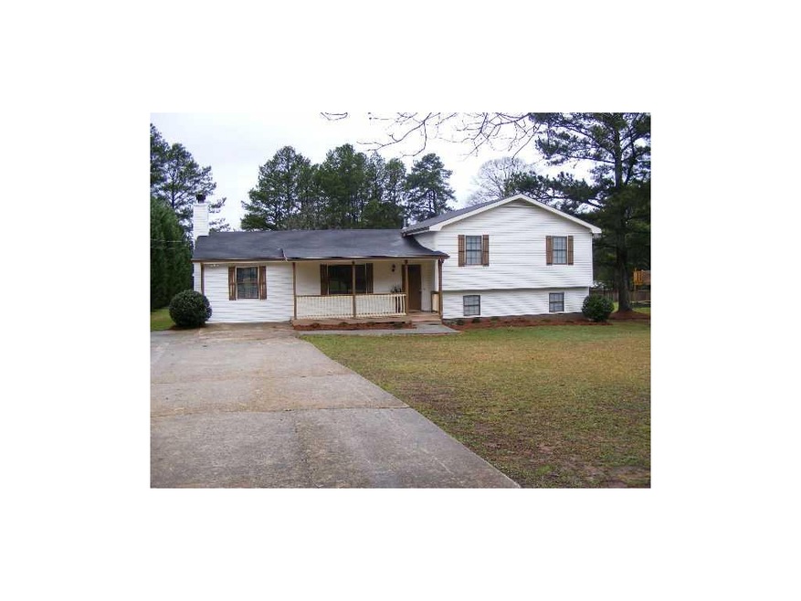 Exterior Front. HUGE LOT*LONG LEVEL DRIVEWAY WITH 