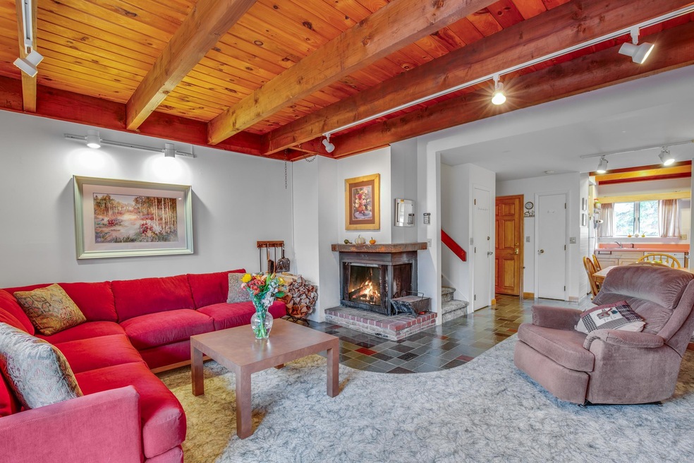Invite everyone over to gather by the cozy firepla