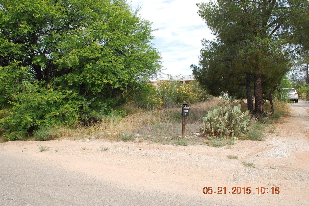 LOT FROM STREET NORTH & EAST DRIVEWAY