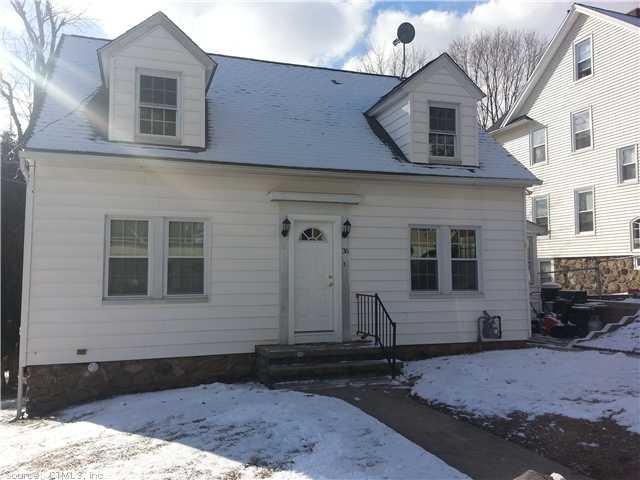 Exterior Front. Vinyl sided, architectural shingle