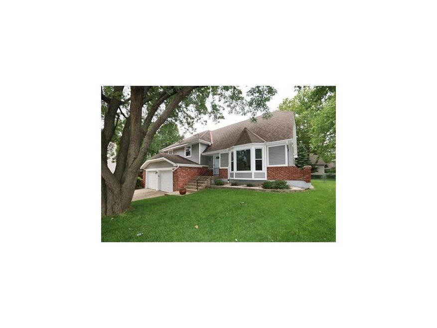Front exterior.  Note bay window.