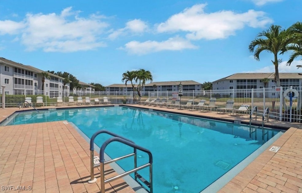 7818 Great Heron Way unit 303, Naples, FL 34104 - photo 1