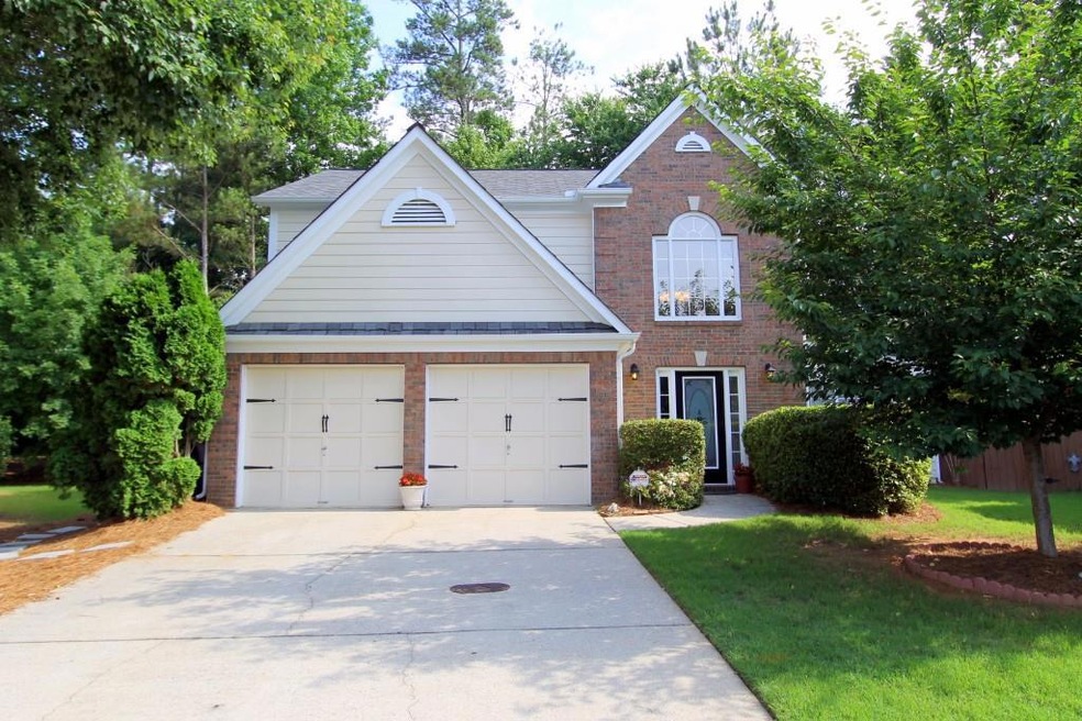 Beautiful brick home on cul-de-sac homesite with l