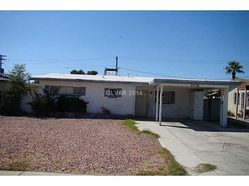 Facade/Exterior Front. Single car covered carport.