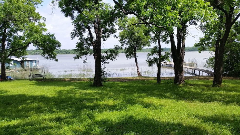 7472 Love Cir, Fort Worth, TX 76135 - photo 1