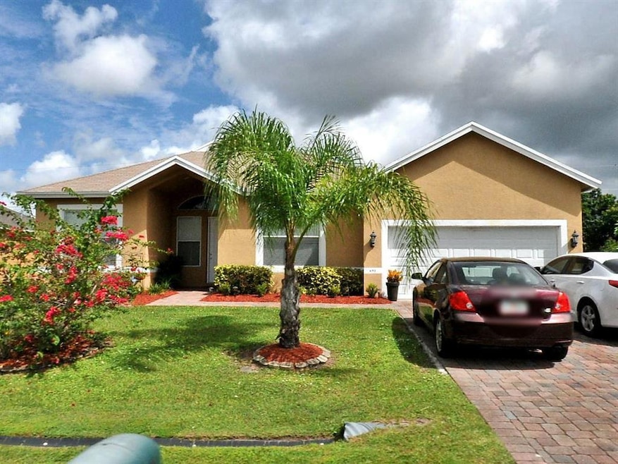Front elevation with paver driveway