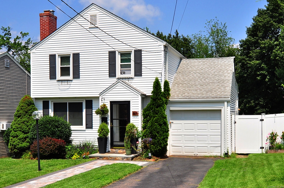 Welcome to 50 Taylor Rd. Vinyl sided Colonial with an attached garage and on a cul- de -sac.
