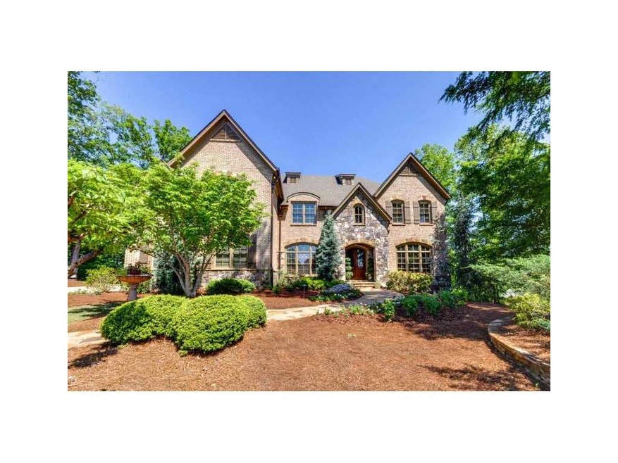 Exterior Front. Beautiful stone and brick home bui