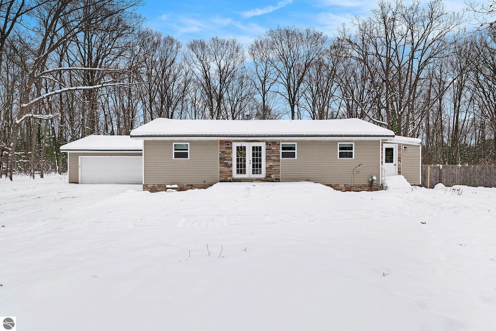 1821 Rogers Rd, Grawn, MI 49637 - photo 1