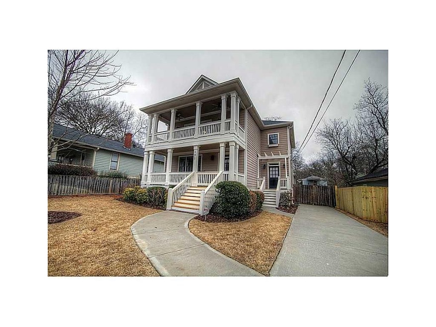 Exterior Front. Gracious front porch, balcony and 