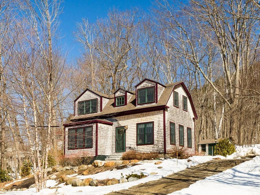 Exterior front and side with yard
