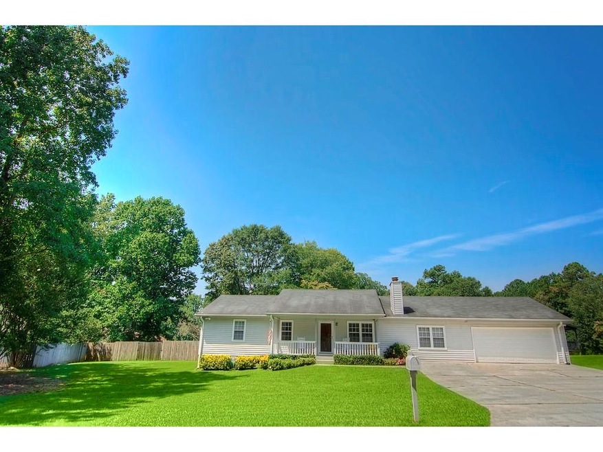 Lovely Ranch located on a large lot with a front p