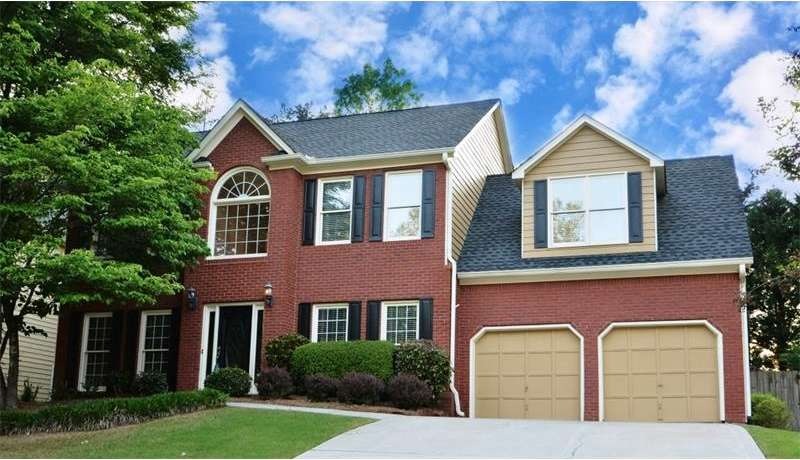 Stately Brick Front Traditional Charm!