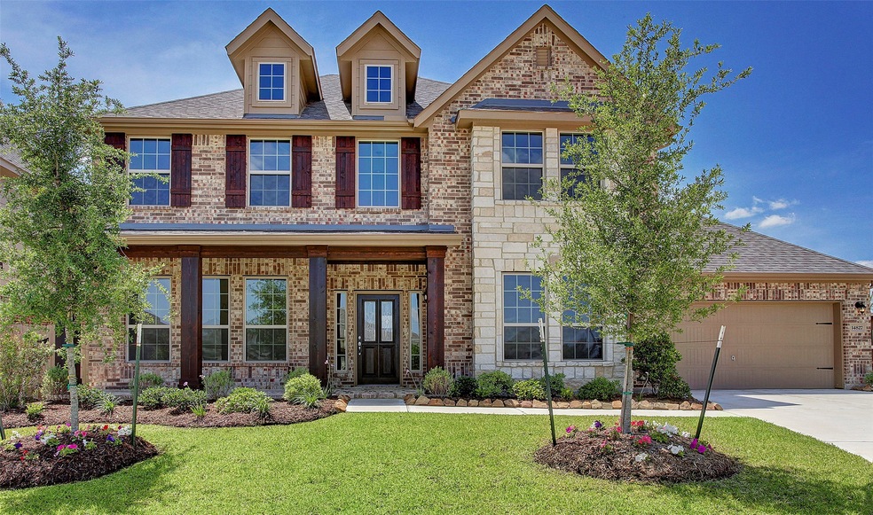 Gorgeous Stanley design by K. Hovnanian Homes with brick/stone elevation AQ in beautiful Enclave at Northpointe.