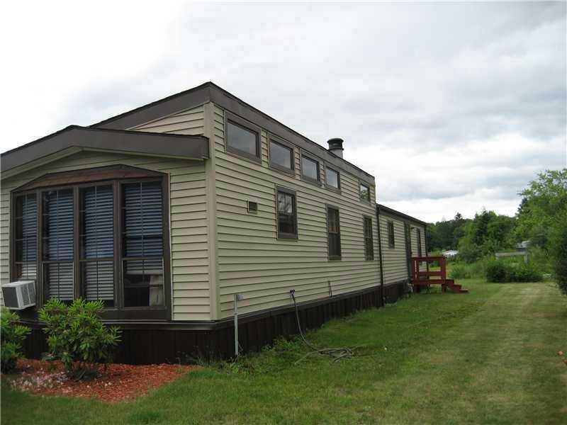 Exterior Front. MAINTENANCE FREE VINYL SIDING WITH