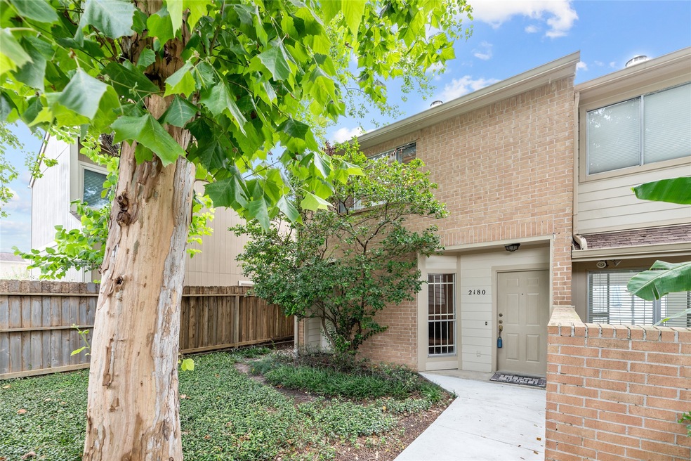 This is a corner unit nestled all the way back in the corner of the complex