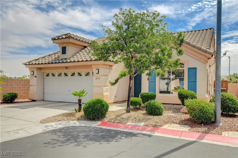 Mediterranean / spanish-style home with a tiled ro