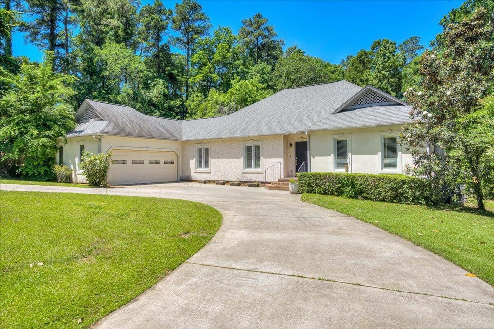 Front of Home with Garage + Driveway