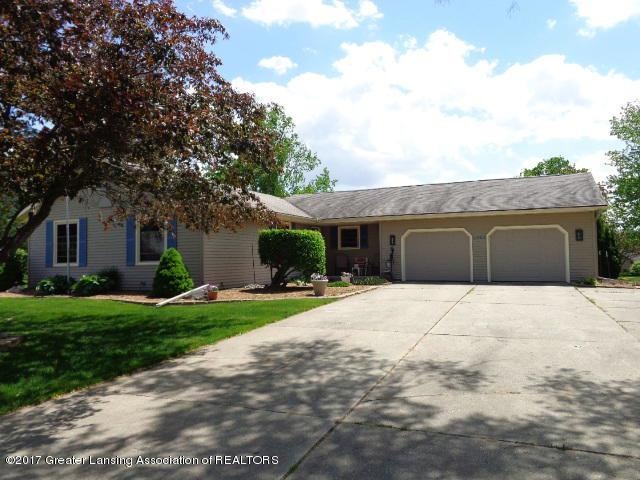 6403 E Millsborough Cir, Lansing, MI 48917 - photo 1