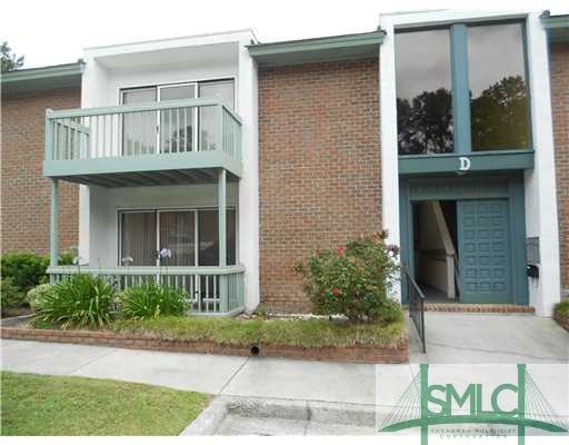 Exterior Front. Ground level condo on western end 