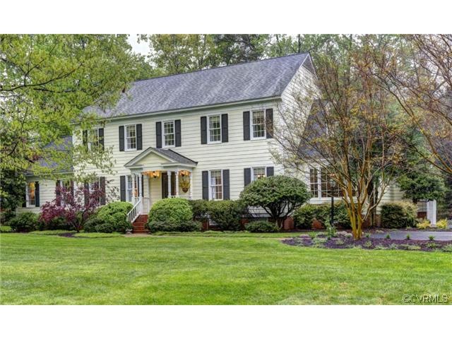 Freshly painted exterior and lush natural landscap
